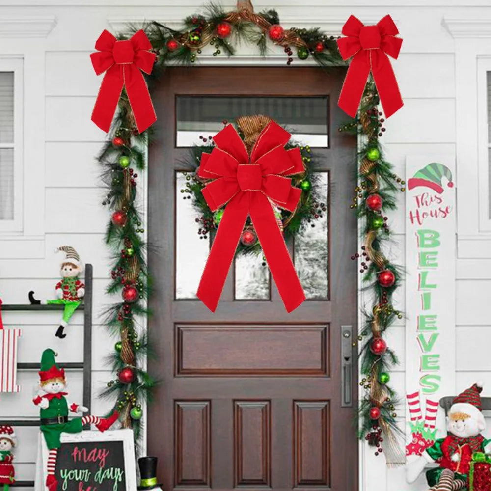 Grand nœud en velours rouge – porte & sapin